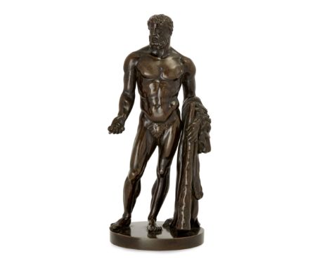 A bronze model of Hercules, French or Italian, first half 19th century, depicted nude holding a club in his left hand with li
