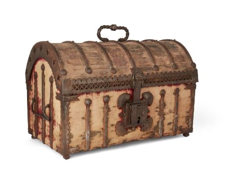 A Spanish iron-mounted crimson velvet wood domed casket, 15th century, bound with straps terminating in scallop shells, the l