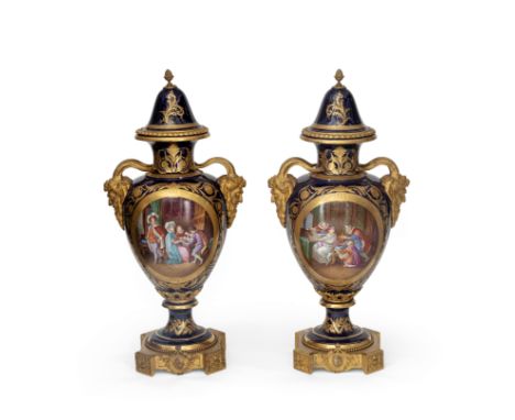 A pair of large gilt-bronze mounted Sèvres-style blue-ground oviform vases and covers, late 19th century, the covers with pse