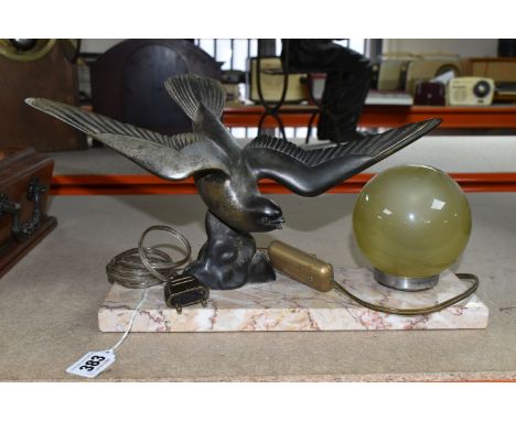 A FRENCH STYLE ART DECO SPELTER SWALLOW LAMP to include a 31cm length x 20 cm height marble base with mounted globe glass, wi
