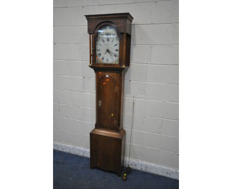 A 19TH CENTURY OAK 30 HOUR LONGCASE CLOCK, the box hood with cylindrical pillars, flanking a glazed door that’s enclosing a p