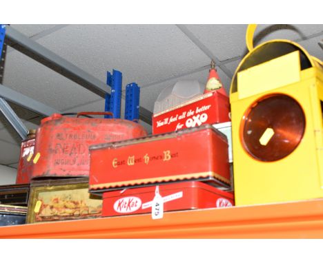 A LARGE COLLECTION OF VINTAGE PETROL CANS AND TINS, comprising a Castrol 'Grand Prix' oil can, three red oil dispensers, a ha