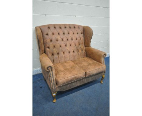 A BROWN SUEDE UPHOLSTERED CHESTERFIELD WING BACK TWO SEATER SOFA, on cabriole front legs, width 130cm x depth 90cm x height 1