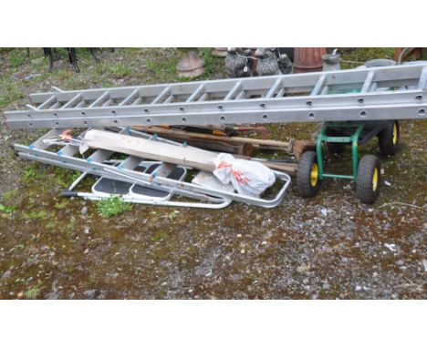A TITAN ALUMINIUM 30 RUNG EXTENTION LADDER, closed length 400cm, a rolling gardening seat, two sized step ladders, along with