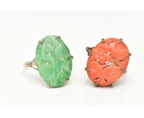 TWO RINGS, to include a carved coral ring, designed as a pierced foliate panel, claw set, to the split shoulders and plain po