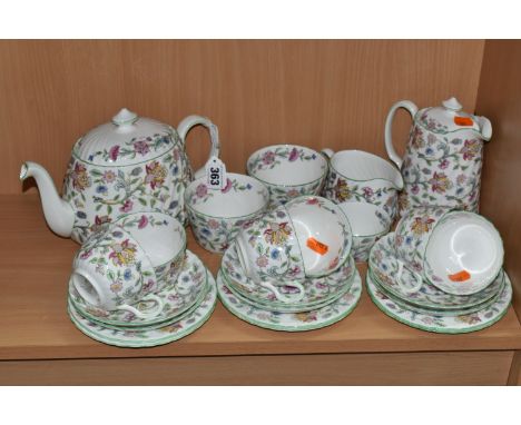 A TWENTY FOUR PIECE MINTON HADDON HALL TEA SET, comprising a teapot, a hot water jug, a cream jug, three different sized suga