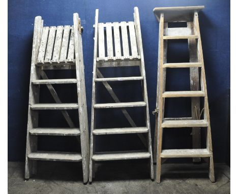 THREE SETS OF WOODEN STEP LADDERS (condition report: marks, scuffs, stains, other signs of usage) (3)
