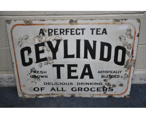 A RECTANGULAR ENAMEL ADVERTISING SIGN FOR CEYLINDO TEA, 92cm x 62cm (condition report: rusted, attempted restoration)
