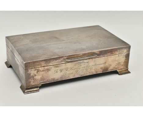 A SILVER CIGARETTE BOX, of a rectangular form, engine turned pattern with personal engraving to the front reads 'To W.R.Horle