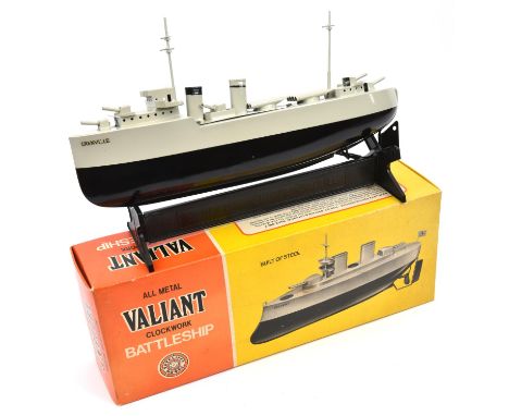 Sutcliffe Valiant clockwork Battleship. In light grey and black, example named 'Grenville'. Complete with both masts, rudder 