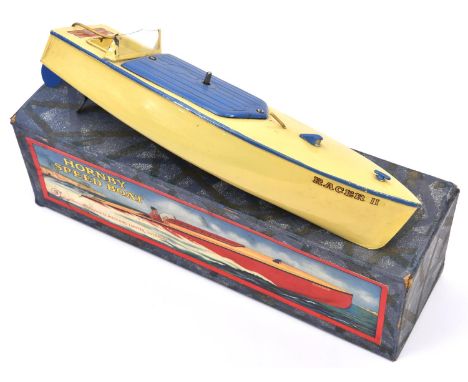 Hornby Speed Boat/Racing Boat No.2. A tinplate clockwork powered boat painted in cream with dark blue band, rudder and motor 