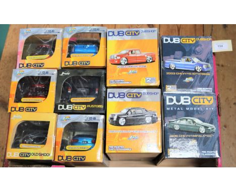 10 DUB CITY 1:24 scale customised vehicles. 1998 Chevrolet Impala SS, 2002 Cadillac Escalade EXT, Hummer H2, 2x Lexus SC430, 