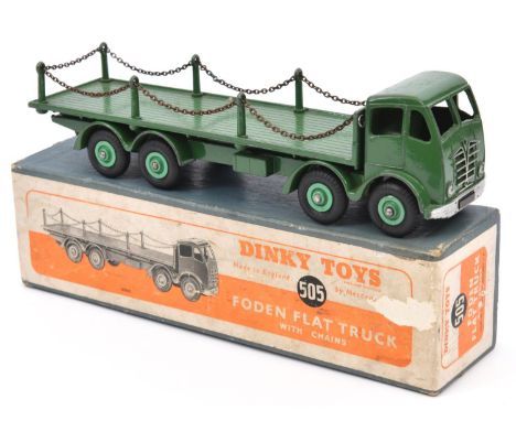 A Dinky Supertoys Foden flat truck with chains (505). An FG 2nd type in dark green with light green wheels. Boxed, some wear.