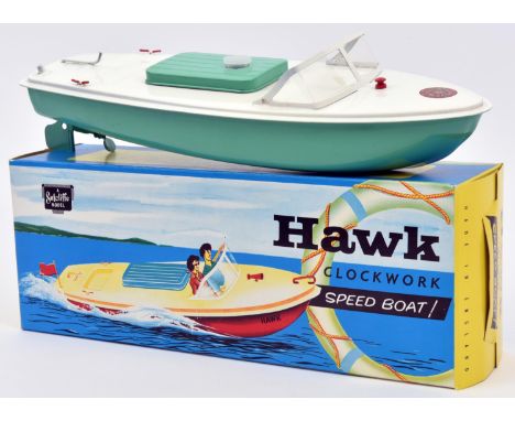 Sutcliffe tinplate clockwork Speed Boat. Named 'HAWK' in white and light green, with light green hatch cover. With rudder, pr