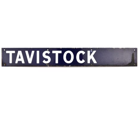 An enamel sign from a departure indicator board.  Possibly from Waterloo for the Southern Railway/BR(S) to Tavistock. White e