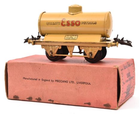 A scarce Hornby O Gauge Petrol Tank Wagon. Example in light brown with 'Quality ESSO petrols' to sides. Boxed. some wear. Con