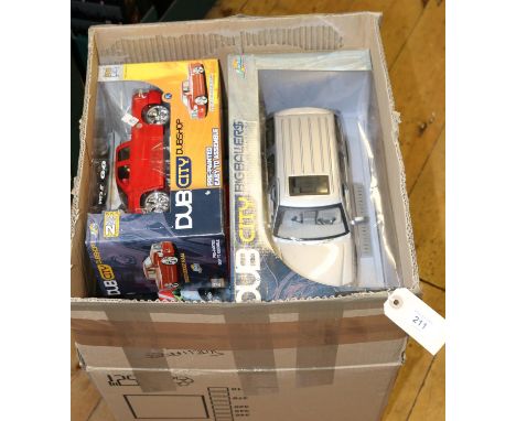 5  Dub City 1:18 scale Custom Vehicles. 2x DUBSHOP series - 2002 Cadillac Escalade in metallic red and a 2002 Chevy Suburban 