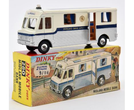 A Dinky Toys Midland Mobile Bank. 280. White and silver body, with blue waist band. Gold crest, clear plastic roof and openin