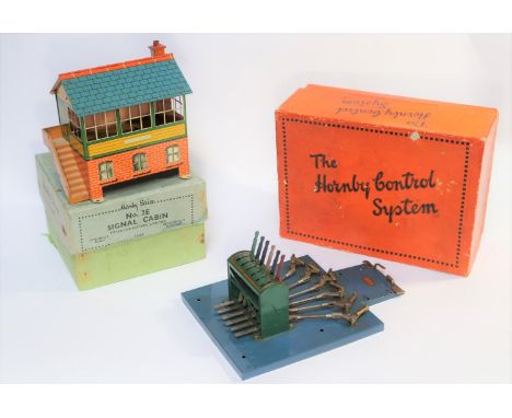 A rare Hornby O Gauge pair. No.2E Signal Cabin with opening rear roof and back panel, light bulb inside, with cut out to lowe