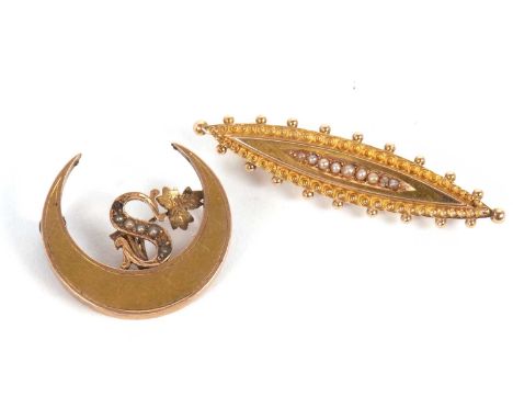 Two seed pearl brooches: the first an early 20th century 15ct navette shaped seed pearl set brooch, stamped 15.625, Birmingha