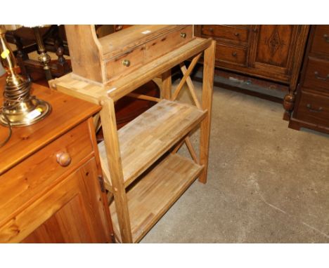 A modern light oak three tier bookcase 