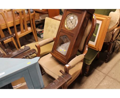 A Victorian style button back elbow chair and one other button back elbow chair 