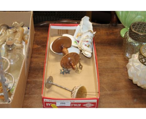 A tray containing a bone china shoe,a  pin cushion, ear-ring stand, miniature cup and saucer etc. 
