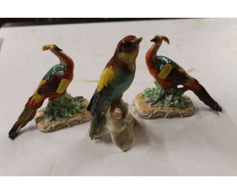 A pair of Dresden porcelain exotic birds; together with a Goebel bird  AF