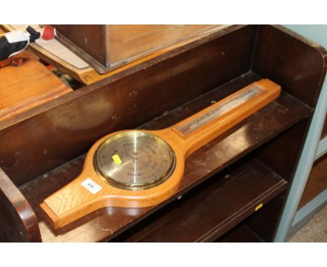 A Comitti of London oak cased barometer 