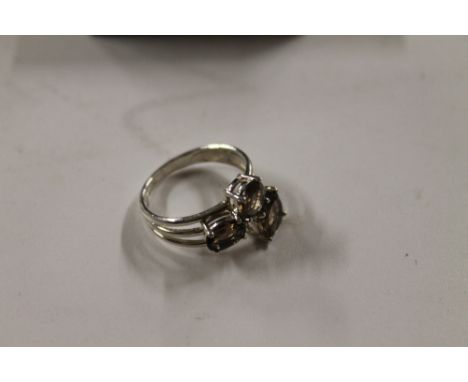 A silver and smoky quartz set ring