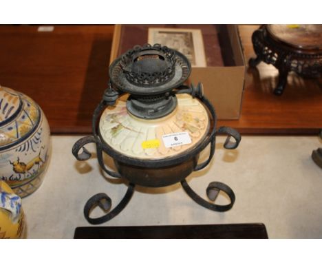 A Royal Worcester oil lamp with Hinks & Sons burner