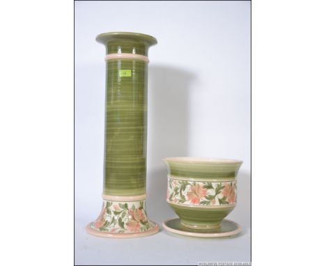A studio pottery three section pottery hand painted planter / jardiniere with marks to the base for Jersey Potteries. Measure
