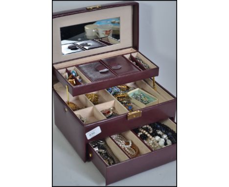 Jewellery casket full of various costume pieces to include working watches , brooches , earrings , retro vintage cufflinks an