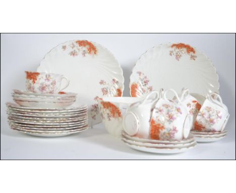 A vintage chintzy floral bone china tea service consisting of trio's, plates etc please see images stamped to base