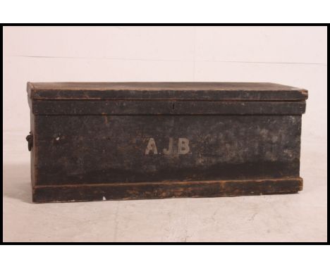 A vintage early 20th century ebonised pine tool box, having a hinged lid opening opening to reveal a removable storage tray, 