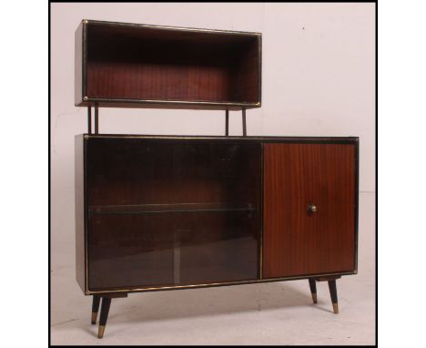 A vintage / retro sideboard with good brass detail handles. 100cm high x 103cm wide x 25cm deep.


