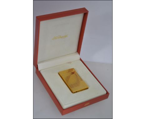 A stunning gold plated Dupont Stylo Plume L2 045290 Laque De Chine cigarette lighter complete in the original leather present