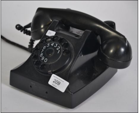 A Vintage PTT Ericsson Ruen Bakelite Desk Telephone, Type 51, made in France, marked '13-61' W24cm