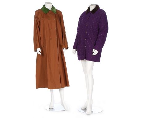 A group of Hermes winter clothing, modern, including a purple quilted coat with velvet collar; a tan Mackintosh with green ve