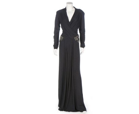 Two black evening dresses, modern, labelled, the first of silk jersey by Roberto Cavalli with plunging neckline and embellish