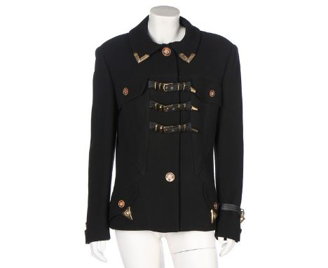 A Gianni Versace bondage-style black wool jacket, Autumn-Winter, 1992-3, couture labelled, with leather buckle straps to fron