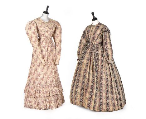 Two printed gowns, the first late 1820s-early 1830s of striped cotton/muslin with delicate grasses and blooms with ruched and