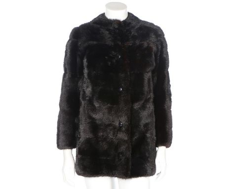 A Givenchy black mink jacket, Boutique labelled and numbered 26246, with bracelet length sleeves and button front, black taff