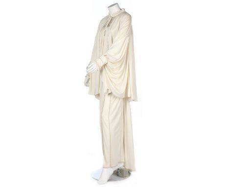 A Bill Gibb off-white Quiana jersey evening ensemble, Spring-Summer 1975, labelled, the gown with square beaded yoke and side