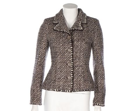 A Chanel flecked brown tweed jacket, 2001, labelled and size 36, with clear CC buttons, brown and white blanket-stitched edgi