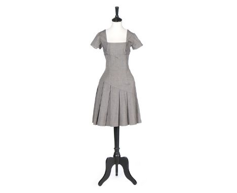 Two John Galliano Prince of Wales checked wool dresses, 'Blanche DuBois', Spring-Summer 1988, Galliano London labels, the fir
