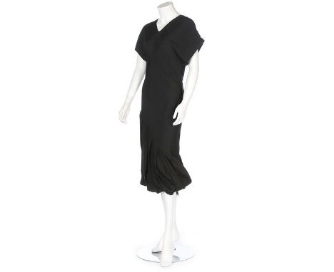 A John Galliano bias-cut black viscose dress, Spring-Summer 1987, Galliano London label and UK 10, with diagonal panels and p