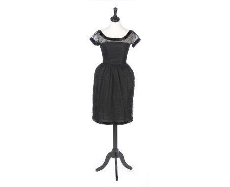 A Christian Dior London black point d'esprit cocktail dress, circa 1960, labelled and numbered 27737, edged in black velvet a