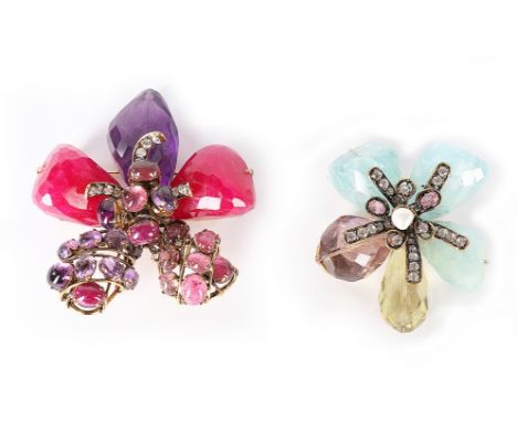 Two Iradj Moini flower brooches, 1990s, signed, one with chunky citrine and quartz petals, 6.3cm diam; the other with ruby an