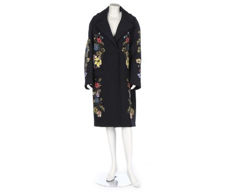 An oversized Erdem coat, modern, labelled and UK size 10, the navy ground with floral print, pres-stud fastened; together wit